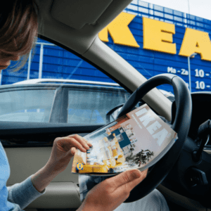 woman reading IKEA catalog