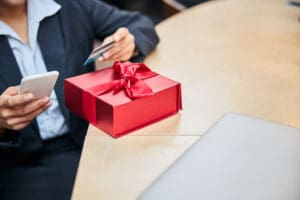 woman with gift and card