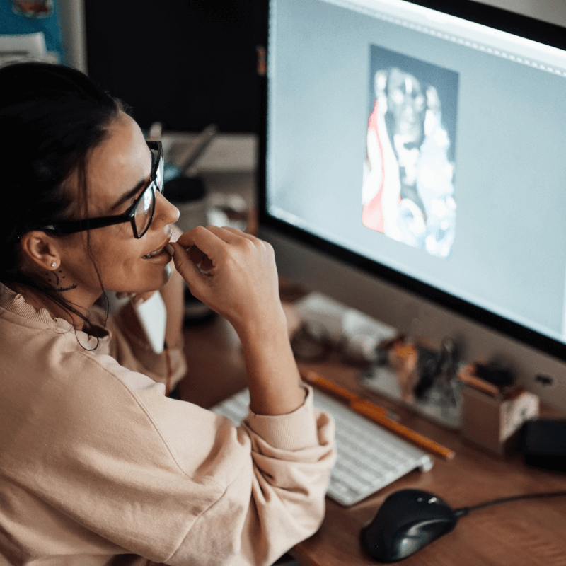 woman working from home in front of computer